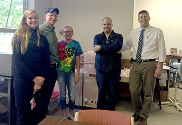 L-R: Sabrina Ufer, Eric Ufer, Sarah Ufer, Erik Sanchez, Sunset Principal John Huelskamp