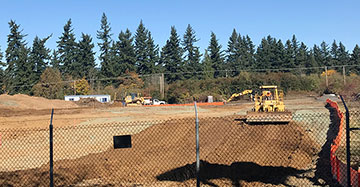 The parking lot adjacent to the Sunset Transit Center is under construction. Peterkort Company said they don&rsquo;t know when it will be open. 