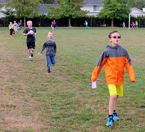 Terra Linda kids on grass field