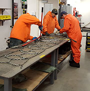 Chain repair in progress.