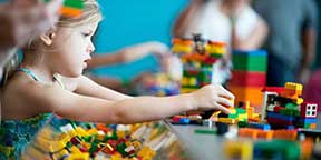 Playing with legos.