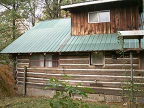 Lyle's log cabin: the window on the left came from the old schoolhouse