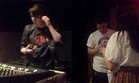 Student techs Kelly Green and Joseph Shingledecker learned to operate the large rented sound board.