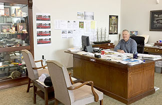 Peter&rsquo;s busy office space , in the warehouse/workshop, showcases some of his collections along with paperwork for the many projects in process.