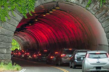 Cars stack up at the tunnel leading to NW Portland. The stacking at times stretches all the way back to the Portland Audubon Society facility.