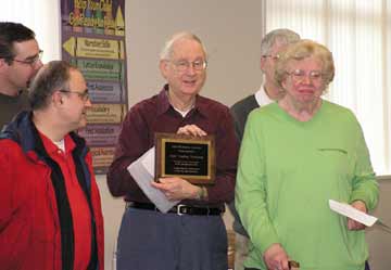 June Newcomer receives a plaque