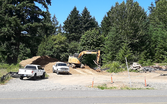 People were speculating that a road was being pushed through here but it's just preparation for utility work for the Life Time project.