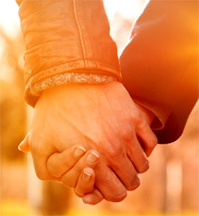 two people holding hands