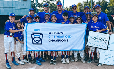 cedar mill little league posing with sign