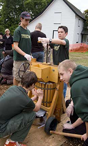 cider festival participants making cider