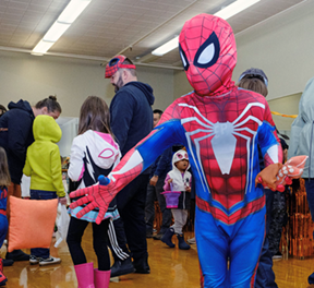 kid in spiderman costume